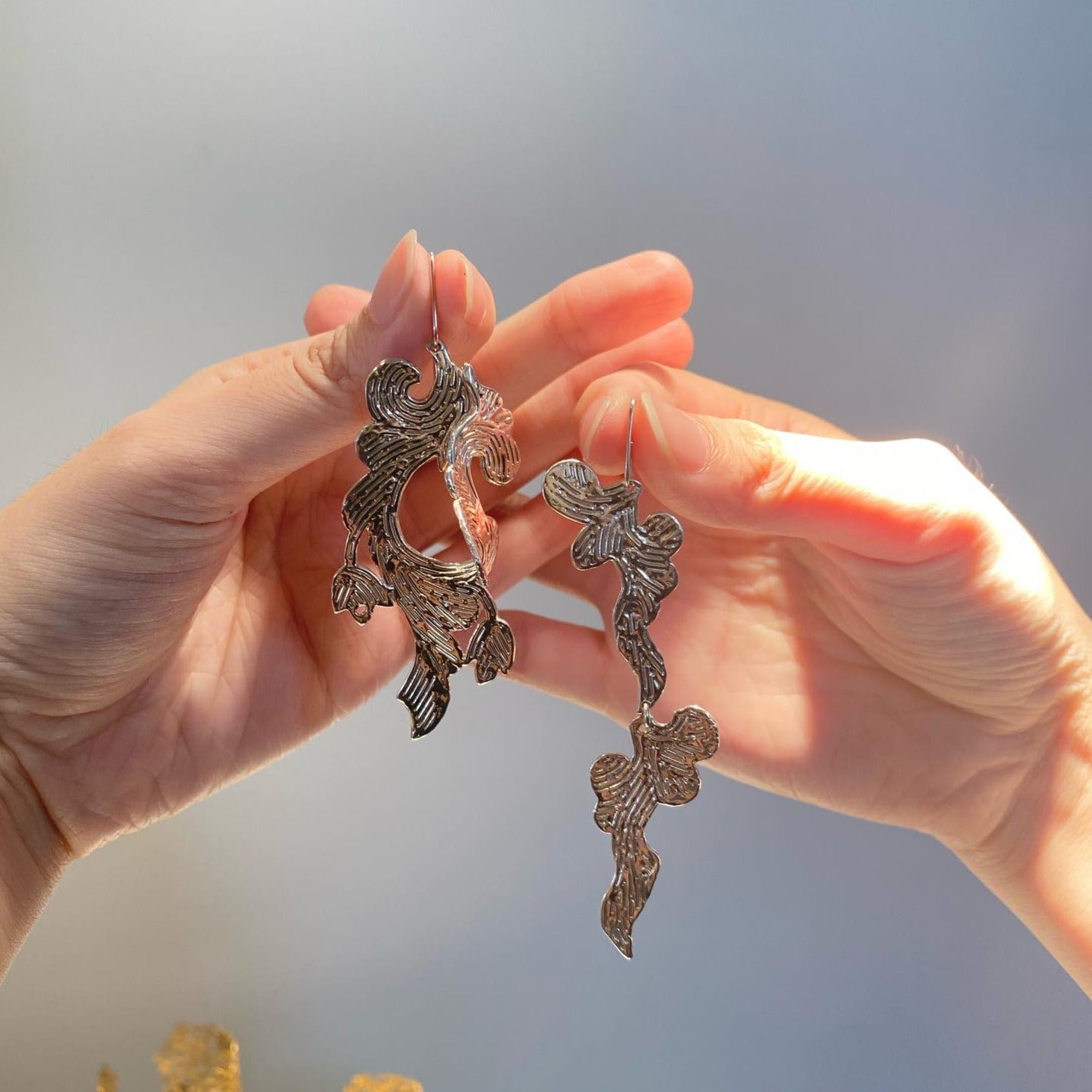 NAM PHƯƠNG silver asymmetrical earrings